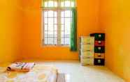 Kamar Tidur 7 Riana Homestay