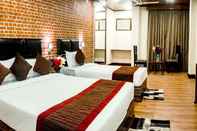 Bedroom Tin Tin Boutique Hotel by Sumi Yashshree