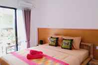 Kamar Tidur Tropical Garden Inn