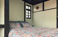 Kamar Tidur 5 Juandaiqi Guest House