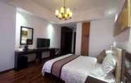 Bedroom 7 Royal Meihao Hotel