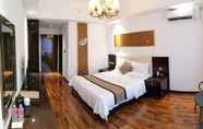 Bedroom 2 Royal Meihao Hotel