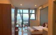 ห้องนอน 5 Zhongxin Holiday Hotel