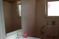 Phòng tắm bên trong Apartamento Flor