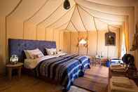 Kamar Tidur Bassou Luxury Camp