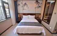 Bedroom 5 Jingcui Huanyi Hotel