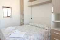 Bedroom Holiday Residence La Madonnina