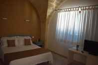 Phòng ngủ Blu Vacanze Residence