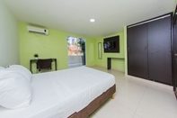 Kamar Tidur Hotel Avexi Suites By Geh Suites