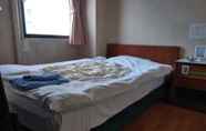 Bedroom 5 Tabist Business Hotel Kanazono Gifu