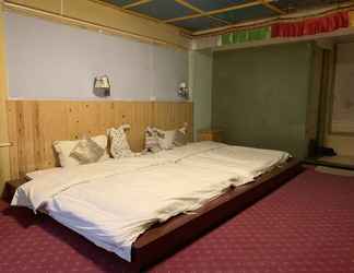 Kamar Tidur 2 Yuqiao Courtyard Hotel