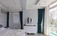 Bedroom 6 Villa AKD1  by JoyLettings