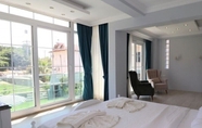 Bedroom 2 Villa AKD1  by JoyLettings