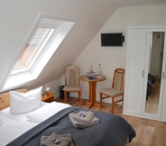 Phòng ngủ 3 Hotel Südstrand Amrum