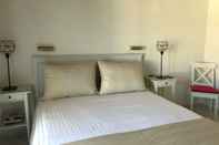 Phòng ngủ Costa Azzurra Hotel