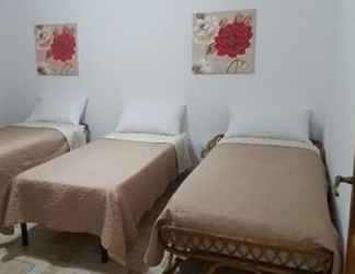 Kamar Tidur 2 Rossy Guest House