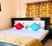 Bedroom 5 On The Ghat by Howdy Hostels