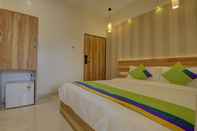 Phòng ngủ Hotel Amisha International