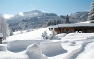 Bangunan 4 Chalets Zöhrer - Wohnen am Wasser