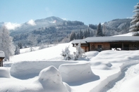 Bangunan Chalets Zöhrer - Wohnen am Wasser