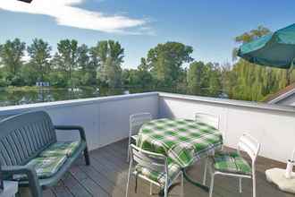 Bedroom 4 Ferienwohnung mit Terrasse und Privatsee