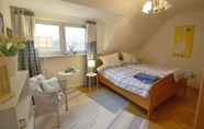 Bedroom 3 Ferienwohnung mit Terrasse und Privatsee