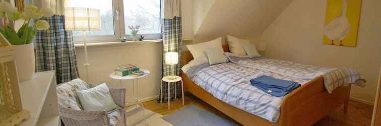 Bedroom Ferienwohnung mit Terrasse und Privatsee