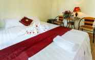 Kamar Tidur 4 Hang Mua Central Homestay