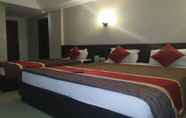 Kamar Tidur 7 Itsy By Treebo - Greenwood Inn And Suites