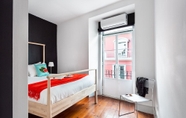 Bedroom 4 ALTIDO Bold & colourful 1-bed flat at the heart of Chiado, nearby Carmo Convent