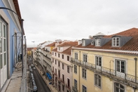 Nearby View and Attractions ALTIDO Spacious 3BR home w/balcony in Baixa, nearby Lisbon Cathedral