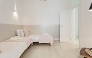 Bedroom 2 ALTIDO Exclusive 4BR home w/3 workspaces&garden in Baixa