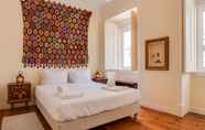 Bedroom 2 ALTIDO Lovely 3BR Apt w/ workspace, nearby Botanical Garden of Lisbon