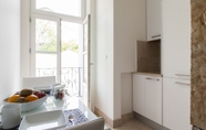 Bedroom 5 ALTIDO Elegant 3BR Apt w/terrace in Baixa, 3mins to Lisbon Cathedral