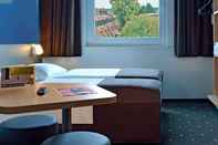 Bedroom B&B Hotel München-Garching