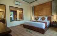 Kamar Tidur 6 The Mudru Resort