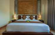 Kamar Tidur 6 The Mudru Resort