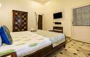 Bedroom 7 Ashapura Niwas by Vista Rooms