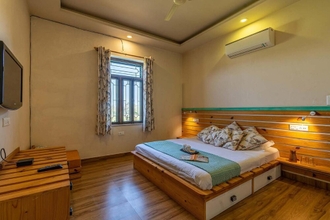 Bedroom 4 Girisadan Farmstay by Vista Rooms