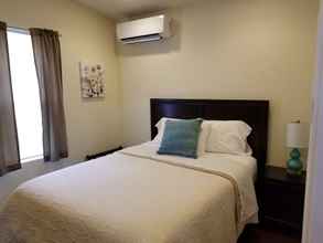 Kamar Tidur 4 Sunset Cottages and Motel