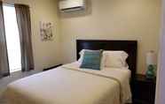 Bilik Tidur 2 Sunset Cottages and Motel