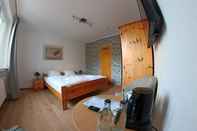 Kamar Tidur Hotel Berghof am See