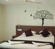 Bilik Tidur 4 Hotel Shivam International