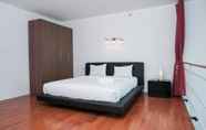 Bedroom 2 Elegant and Spacious 1BR Apartment at Citylofts Sudirman