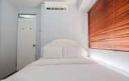 Bedroom 2 Cozy 2BR Apartment at Gading Nias Residences