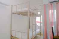 Bedroom Green Bay Pluit Studio Apartment with 2 Single Beds