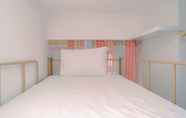 Bedroom 4 Green Bay Pluit Studio Apartment with 2 Single Beds