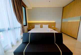 Kamar Tidur 4 Spacious Studio Room at Capitol Suites Apartment