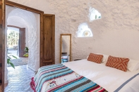 Bedroom Traditional Cave House With Swimming Pool Near to City Center. Cueva del Cadí