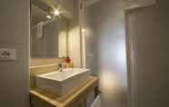 In-room Bathroom 7 Tramura Guest House